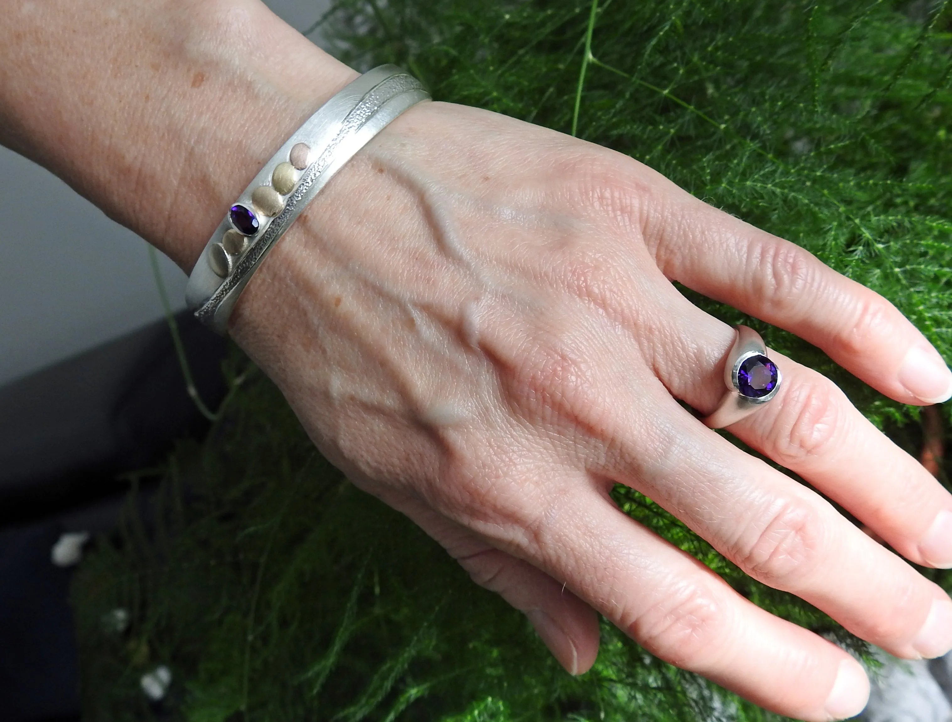 Rounded wrap bezel ring with Amethyst