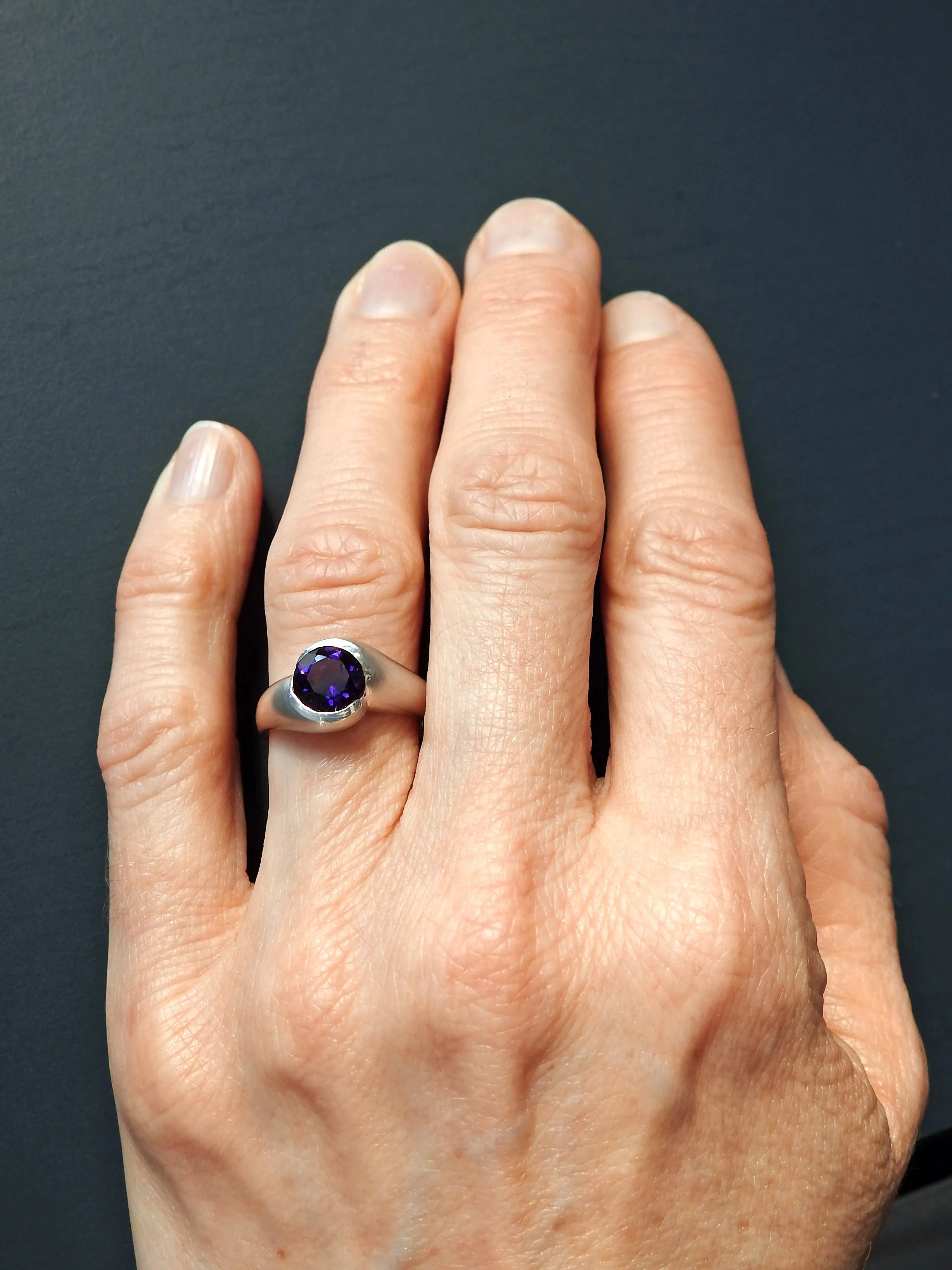 Rounded wrap bezel ring with Amethyst