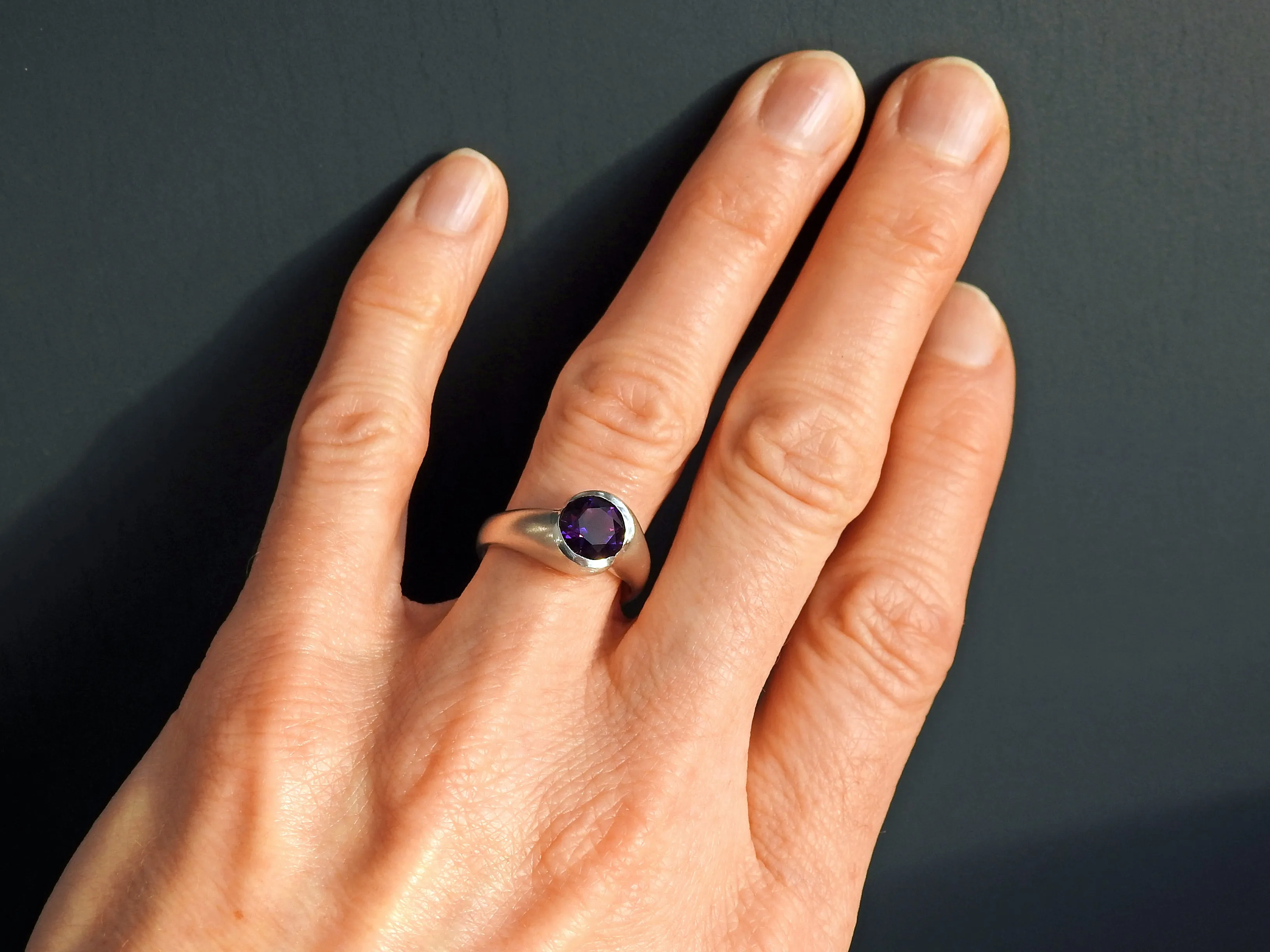 Rounded wrap bezel ring with Amethyst